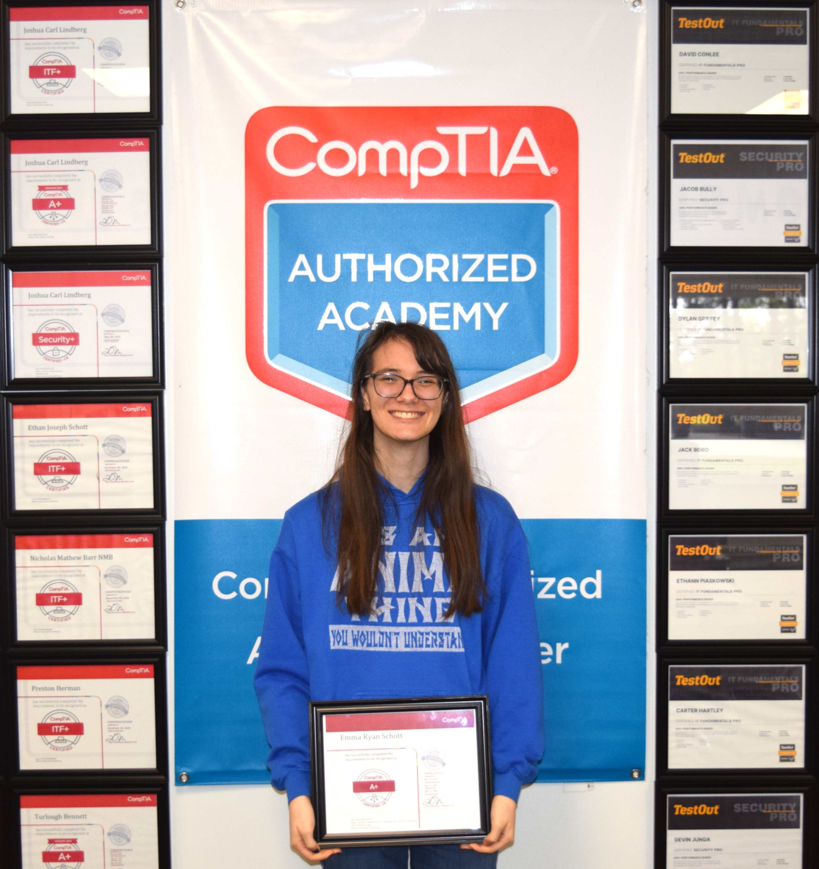 Female student holding certification